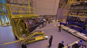 NASA Attaches First of 4 RS-25 Engines to Artemis I Rocket Stage